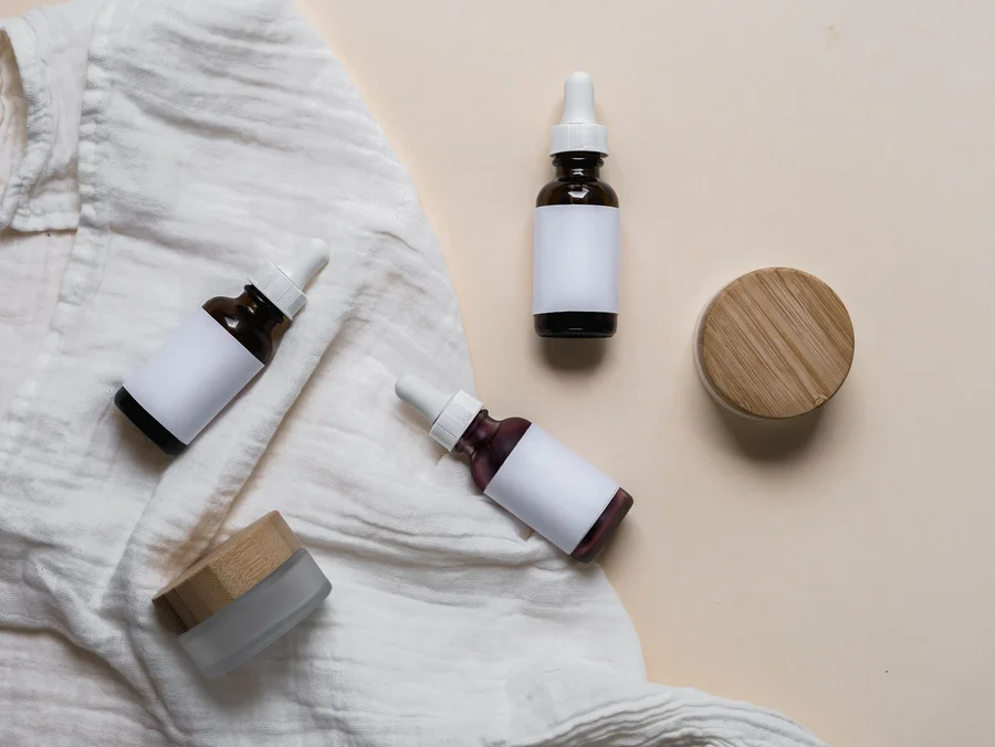 Amber wellness dropper bottle in soft natural light